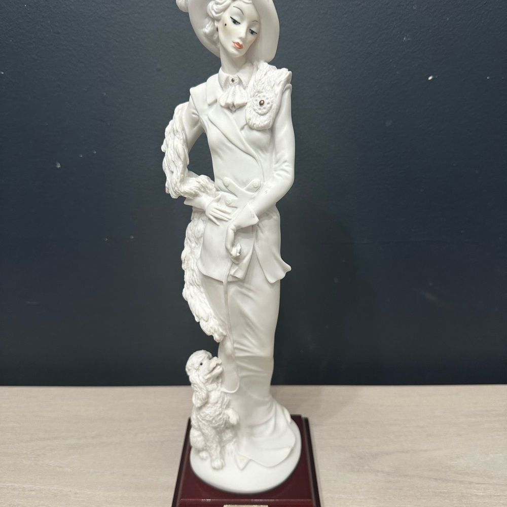 Chic White Ceramic Sculpture with Poodle